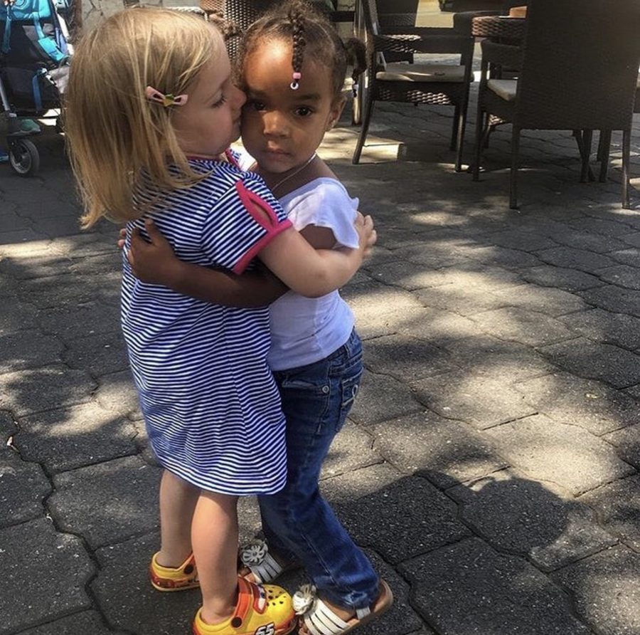 Two little girls hugging