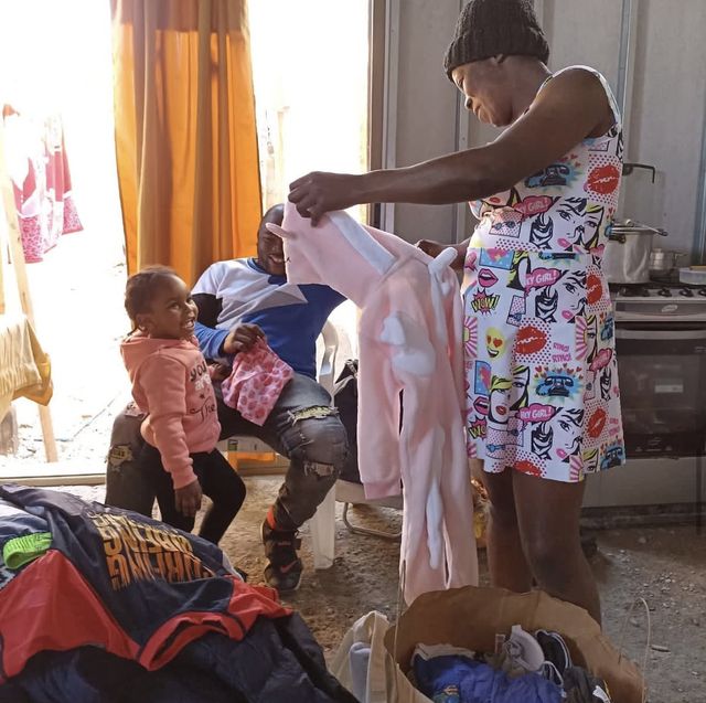 Macul: we delivered clothes and other items to a Haitian family in a campamento.